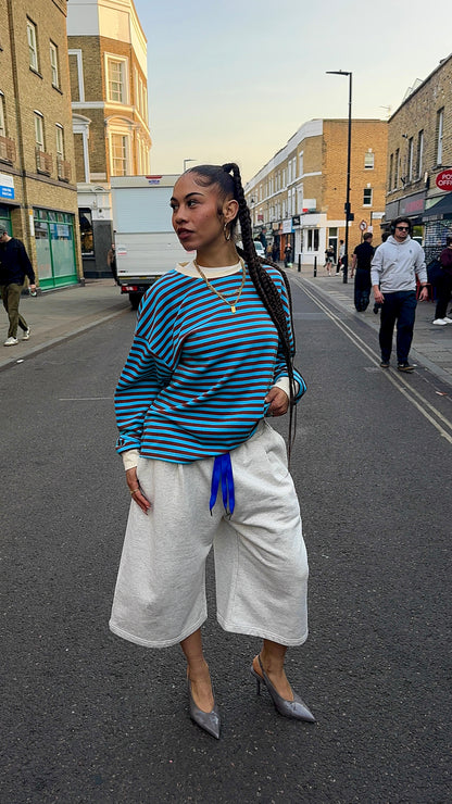 Woman wearing Blue Stripped Long sleeve
