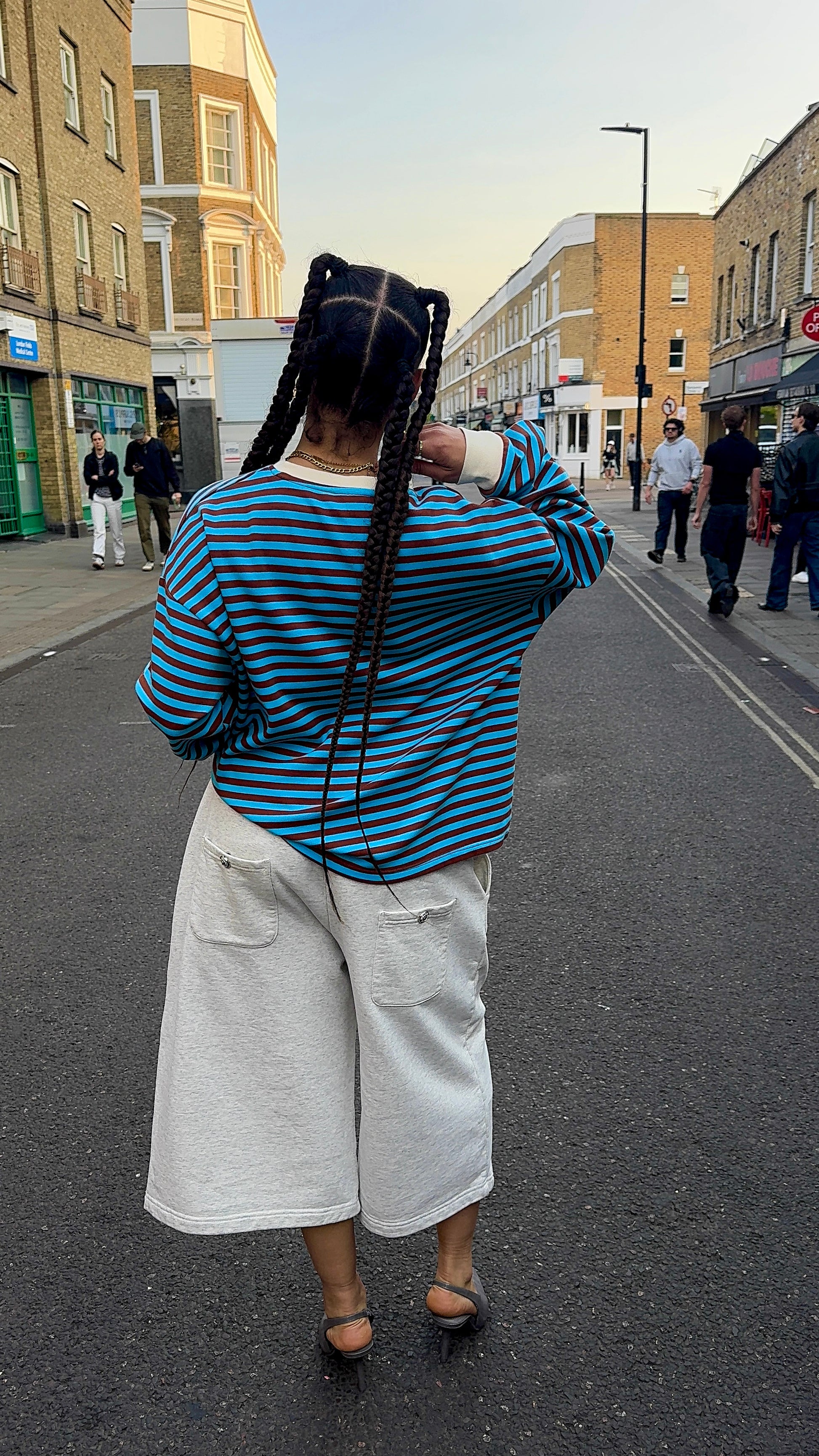 Woman wearing Blue Stripped Long sleeves