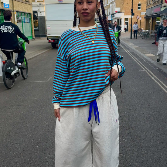 Woman wearing Blue Stripped Long sleeves