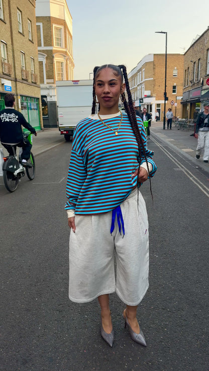 Woman wearing Blue Stripped Long sleeves